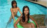 Asian teen swimming-w354xhms7a.jpg